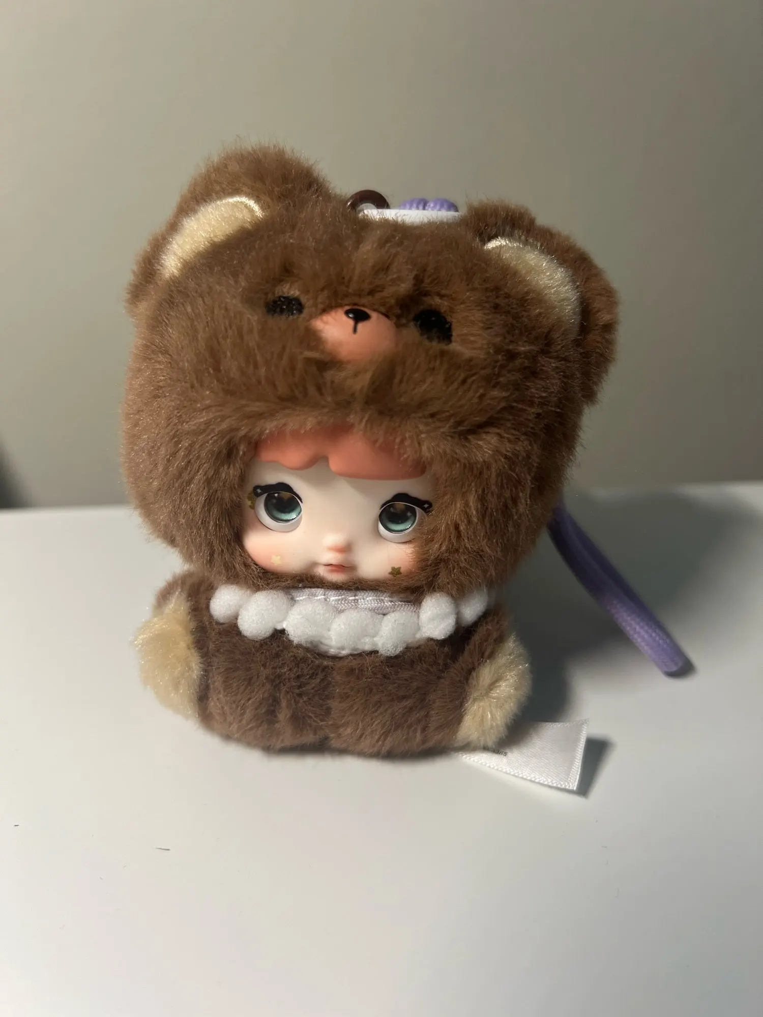 Nommi Mocha Baby Image